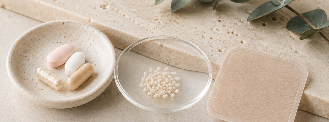 Pills, pellets and a hormone patch on a stone surface